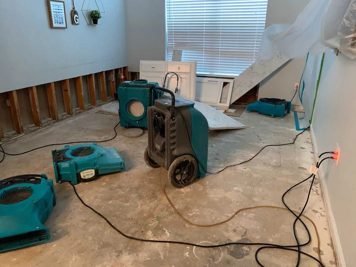Dehumidifier in flood-cut room for Water Damage Restoration in Madisonville